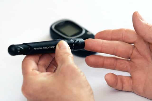 Man holding medical device for Wireless Medical Device Testing